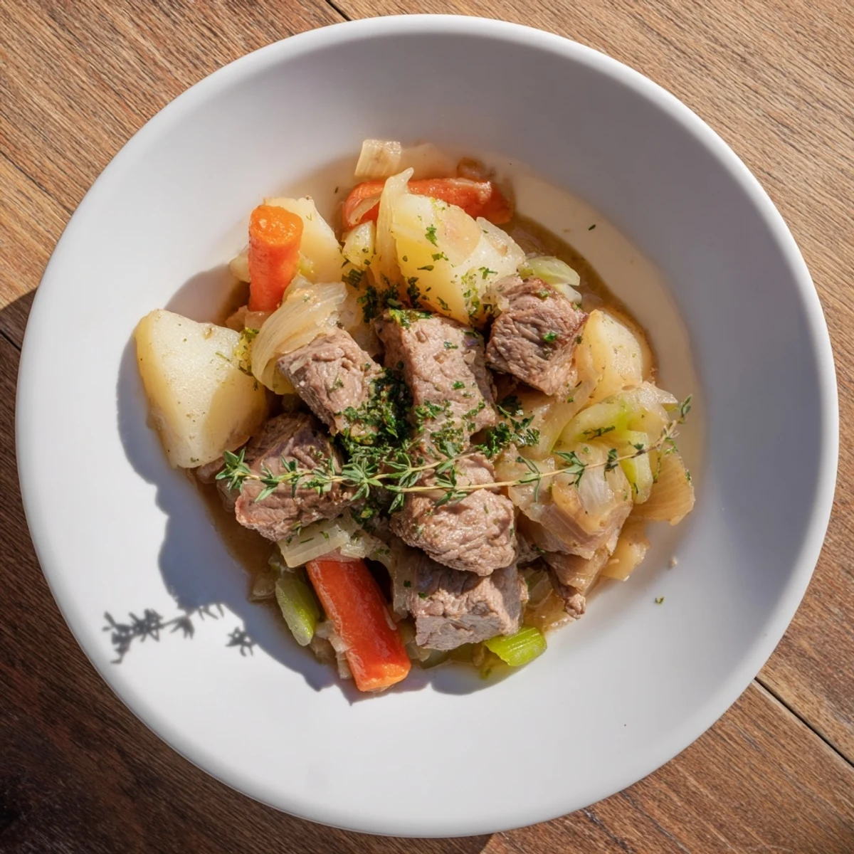 Enjoy warm, comforting lamb and potato stew, perfect for a chilly evening with crusty bread.