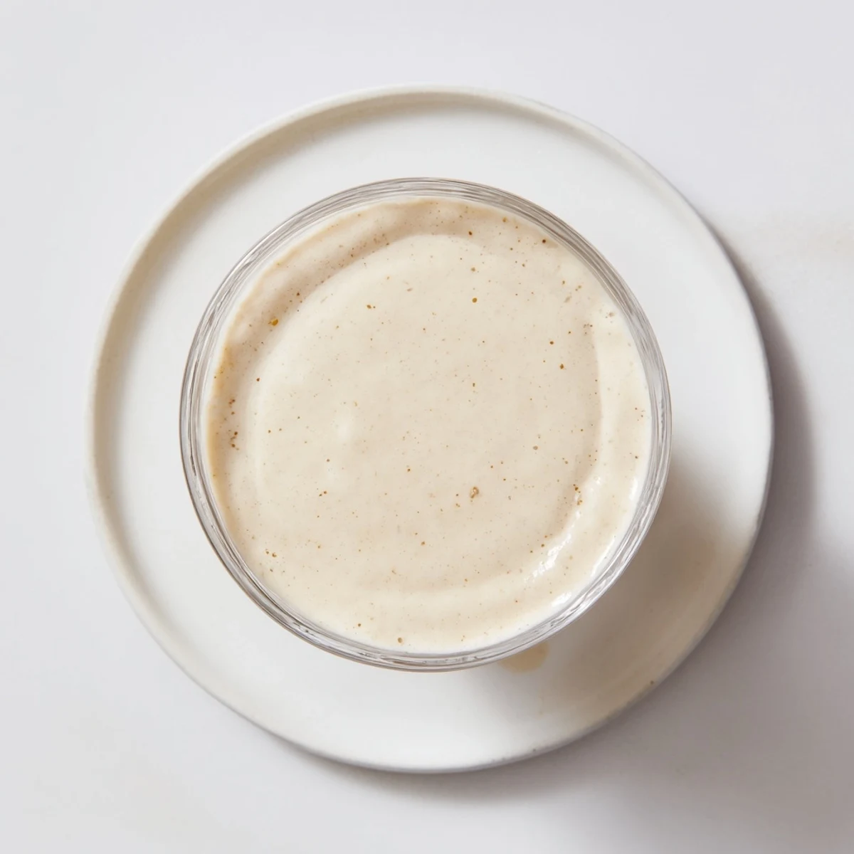 Fresh banana smoothie, blended smooth, ready to serve in chilled glasses for a quick breakfast.