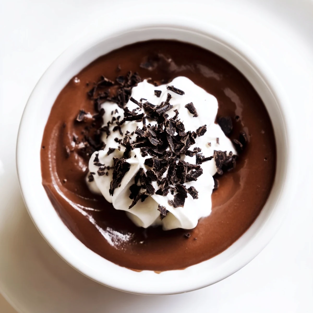 This homemade dark chocolate pudding is thick, glossy, and perfectly chilled: chocolate heaven!