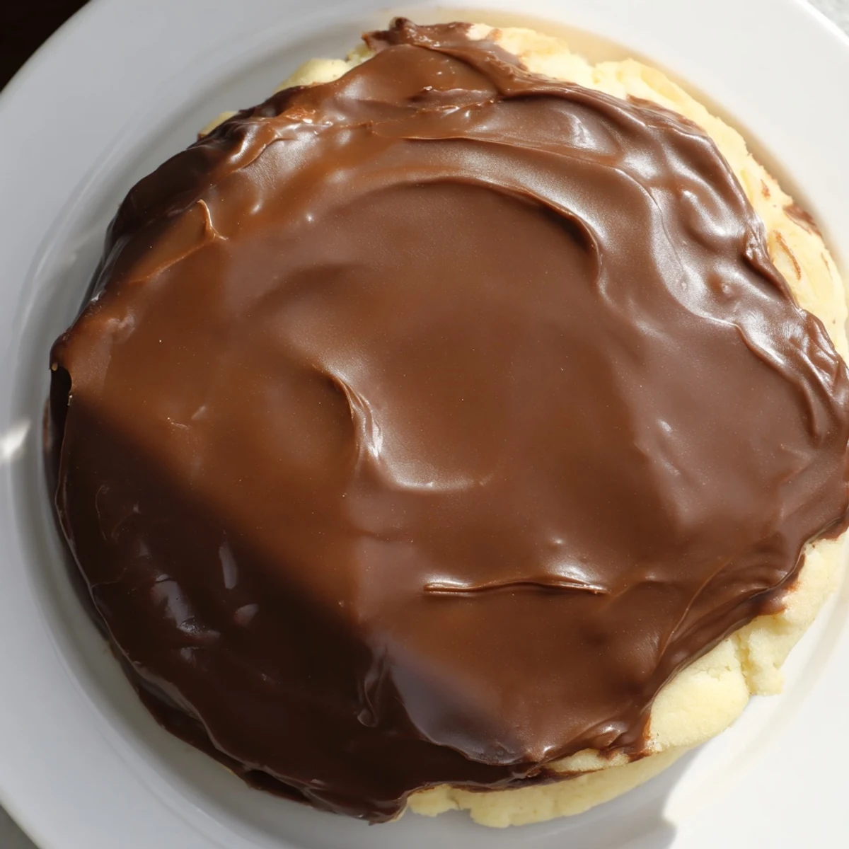 Freshly baked Twix Cookies arranged on a cooling rack, showing golden edges and gooey caramel filling ready to serve.