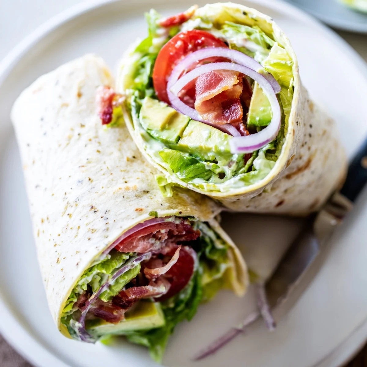 Stacked in foil and ready, these Meal Prep BLT Wraps make weekday lunches