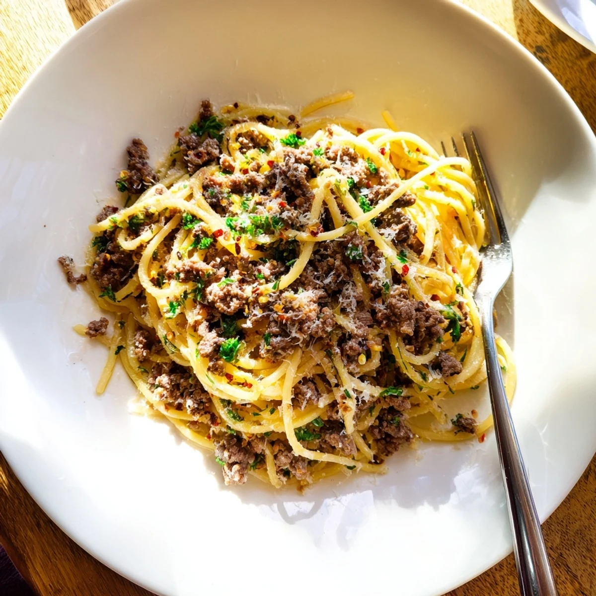 Golden browned beef tossed through silky Garlic Butter Pasta With Ground Beef noodles