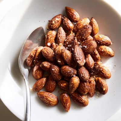 Crunchy roasted almonds fresh from the oven on parchment paper